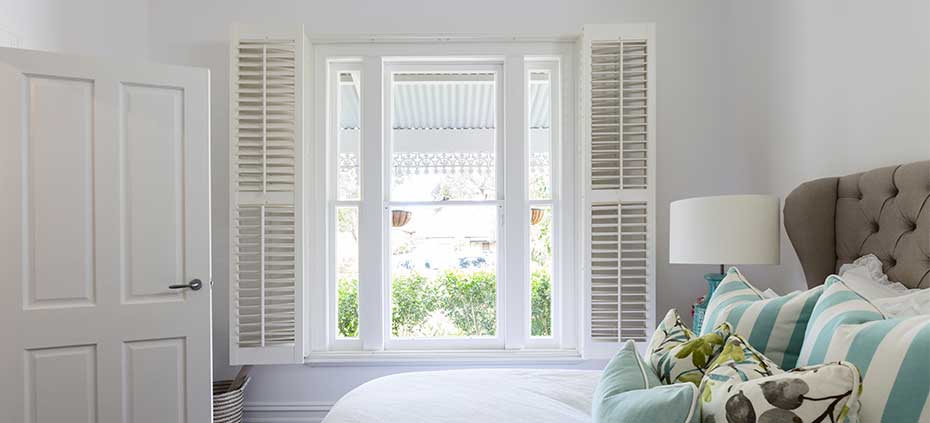 Bedroom with Custom Interior Shutters